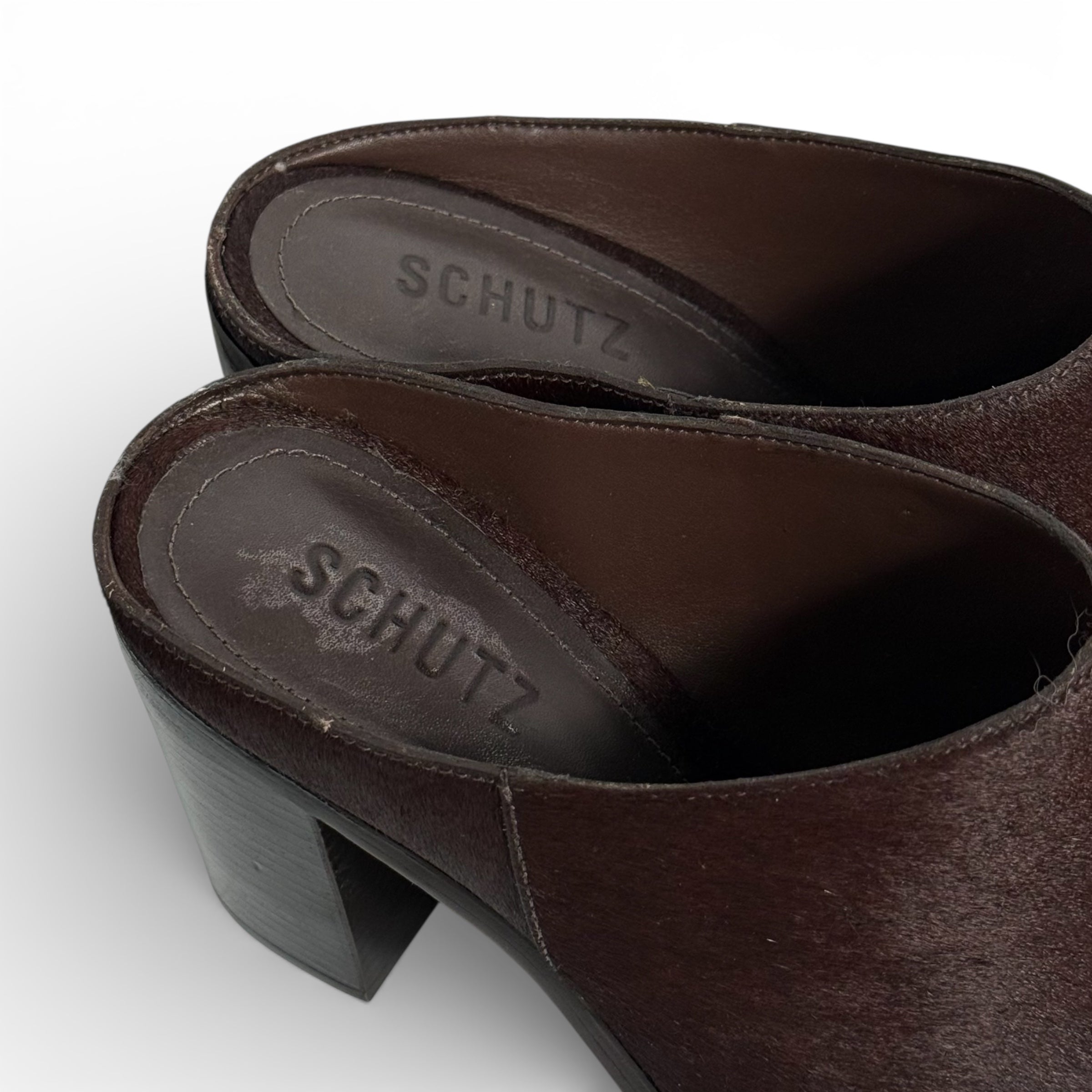 schutz mikki mules in dark red calf hair